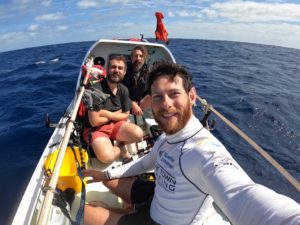 Johnnie Stef and Dirk at sea in an ocean rowing boat