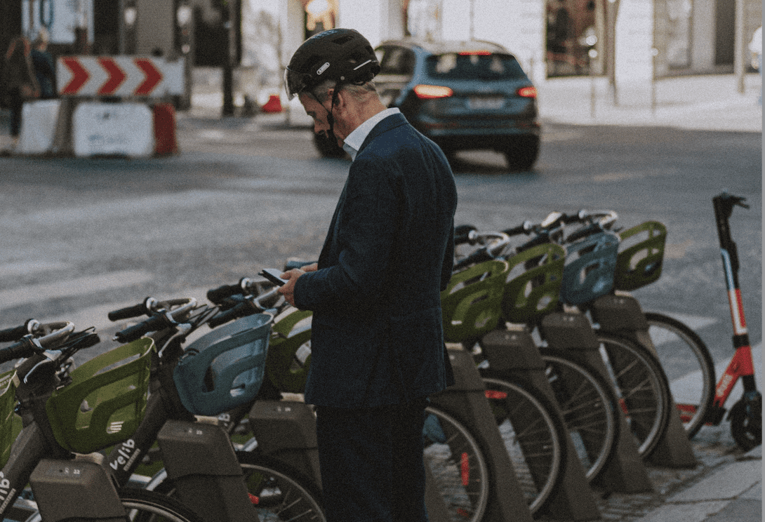 Closeup of man unlocking bike